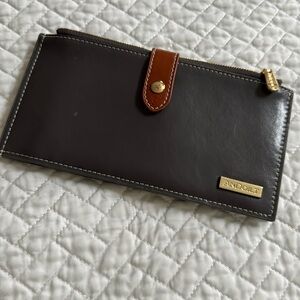 Andoilt gray wallet with numerous card holders.